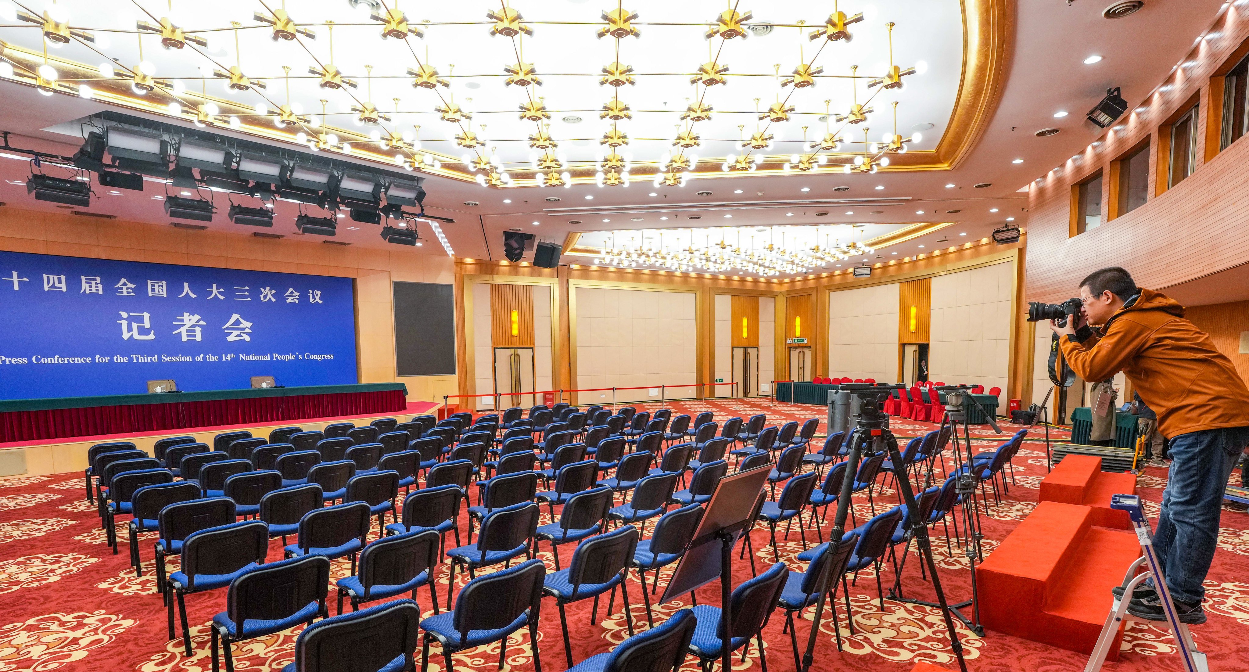 A journalist works at a press centre in Beijing on Thursday ahead of China’s annual legislative meetings. Photo: Xinhua