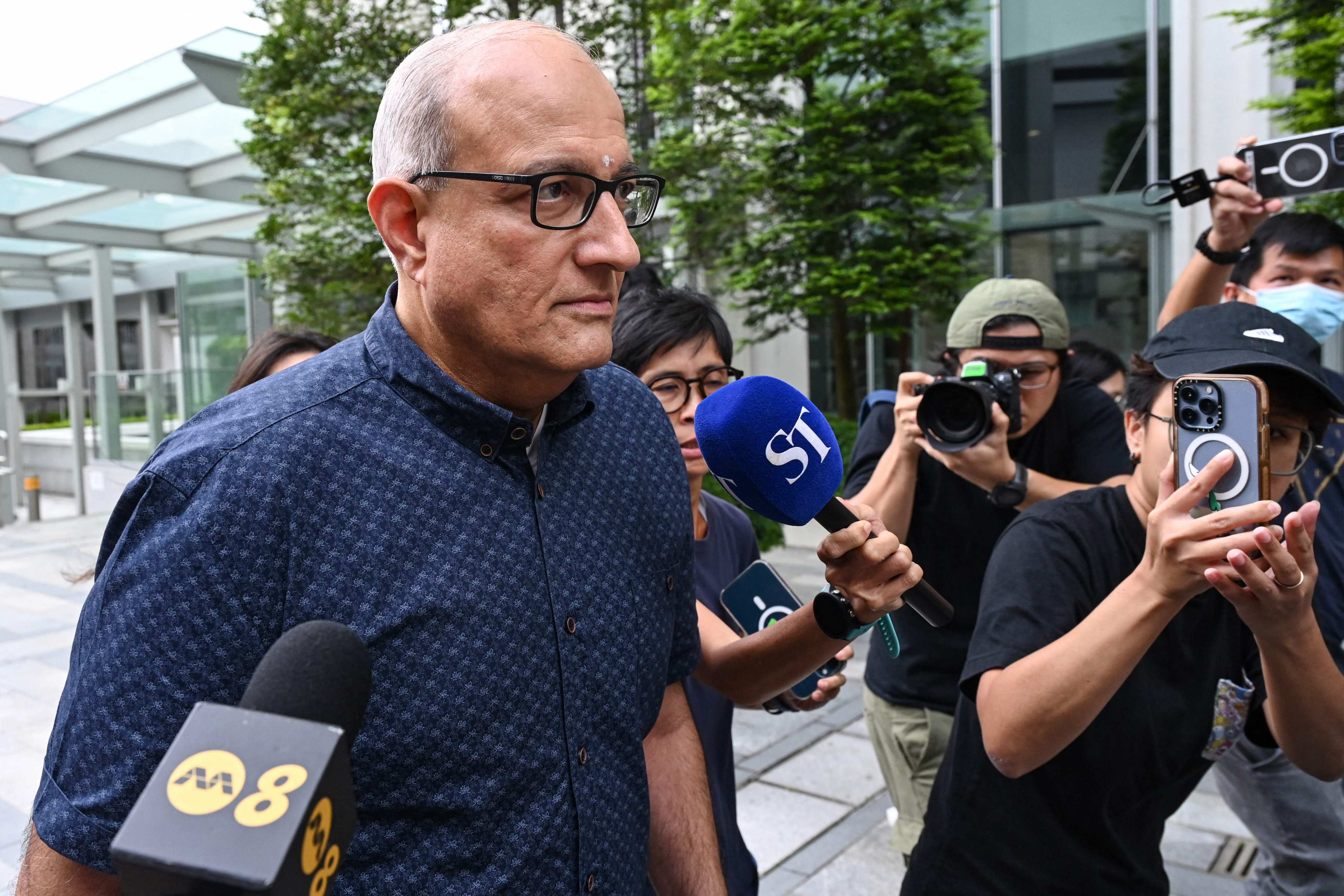 Former Singapore transport minister S. Iswaran arrives at the State Court on October 7, 2024, to begin serving a 12-month prison sentence for accepting gifts and obstructing justice. Photo: AFP
